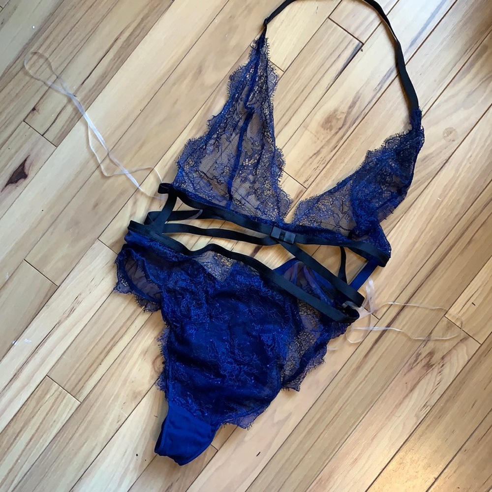 Never worn lace bondage body suit